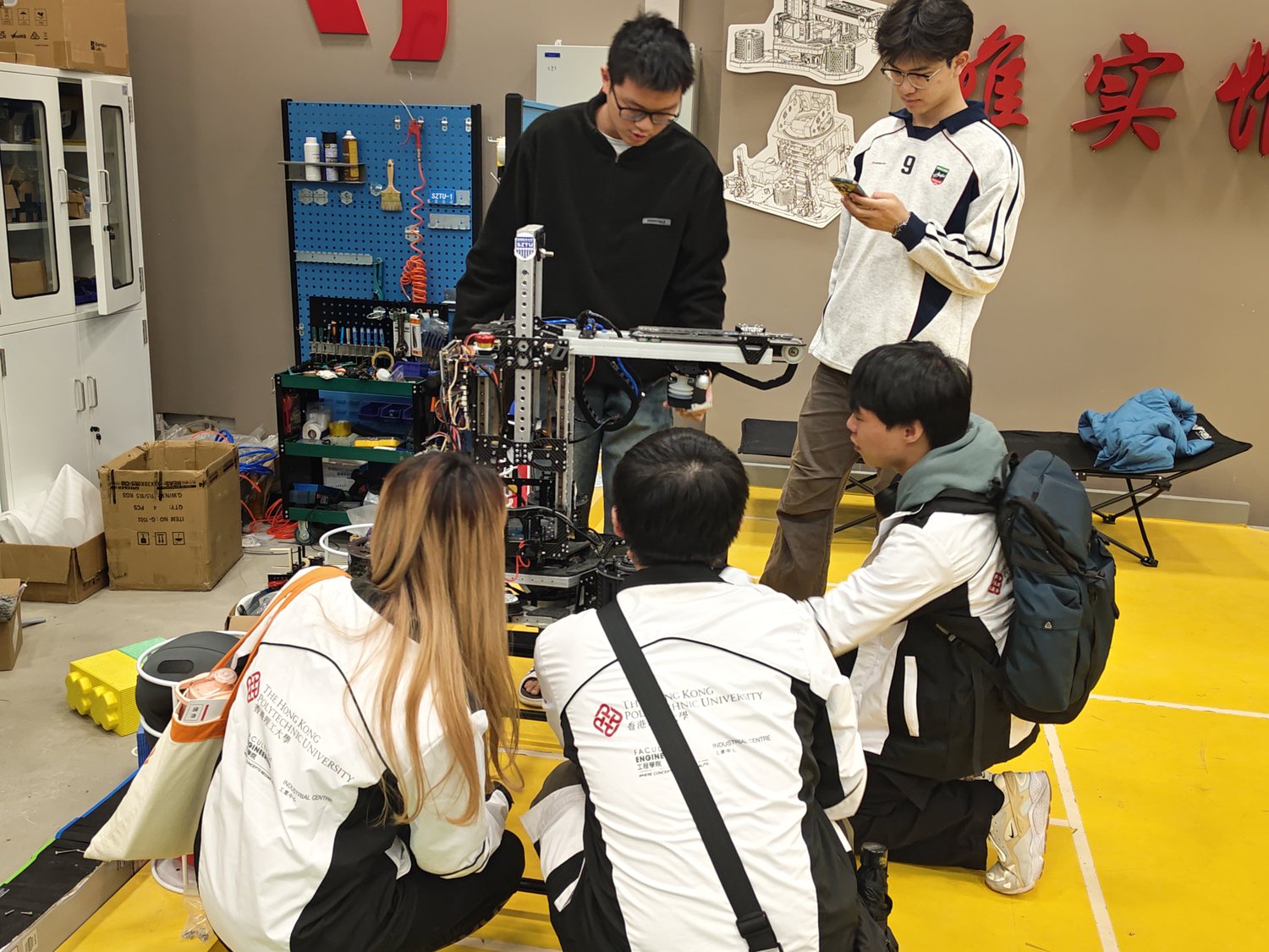 Members discussing robotics hardware and platforms