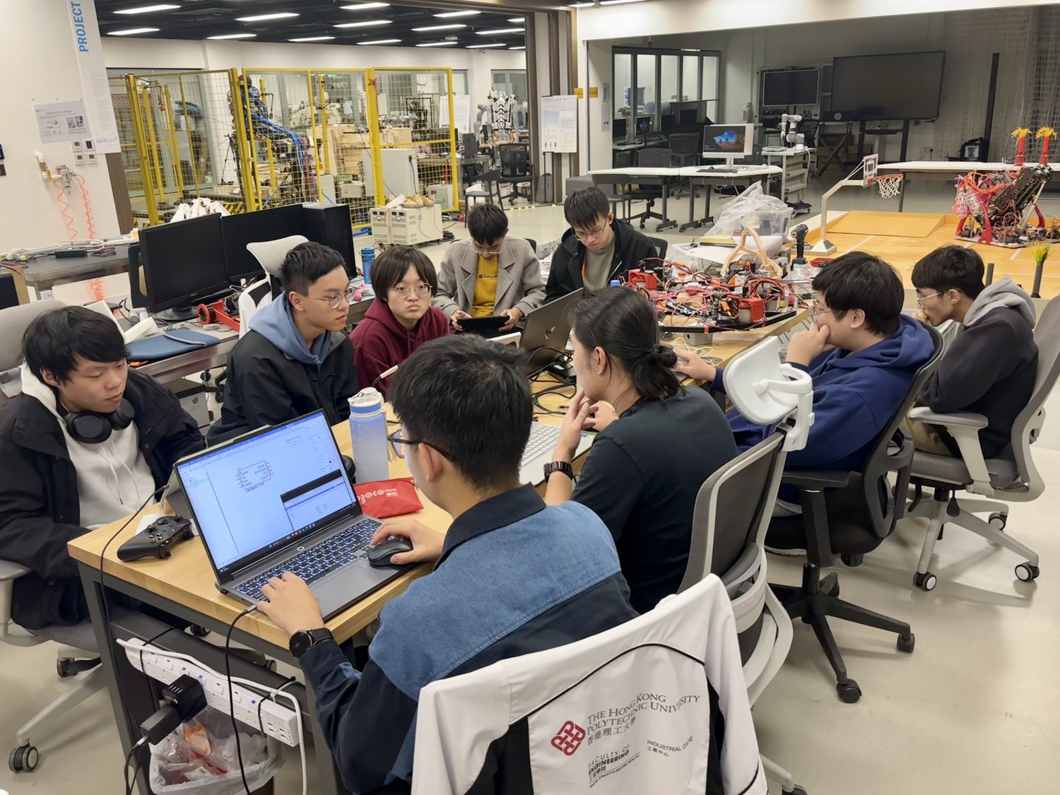 Previous PolyU Robotics Club members working together